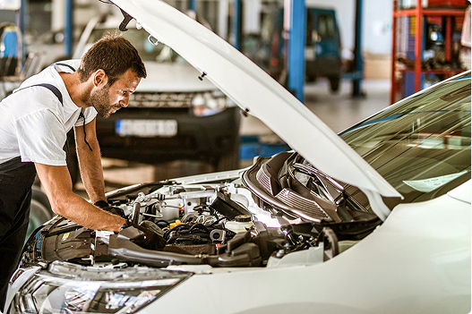 Mechanic working on car