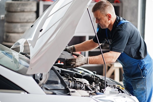 Mechanic working on car